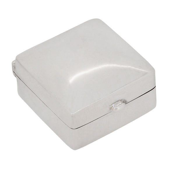 A modern, silver, plain, square pill box