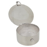 A modern, silver, abalone set, circular pill box