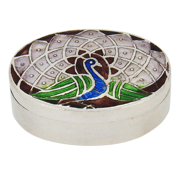 A modern, silver, enamel set, oval pill box