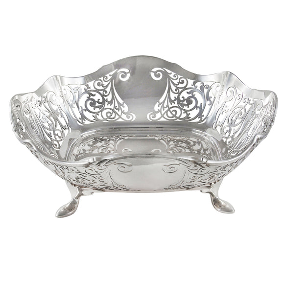An early 20th century silver fruit bowl on four feet