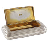 A Georgian, silver snuff box with a gilt interior open