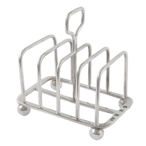 An Edwardian, silver, small, four slice toast rack