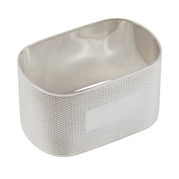 A mid-20th century, silver, engine turned napkin ring.