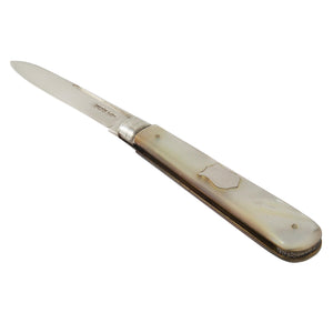 An early 20th century, silver fruit knife with a mother of pearl set handle