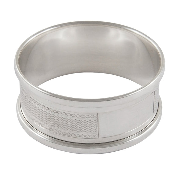 A mid-20th century, silver, engine turned napkin ring.