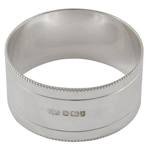 An Edwardian, silver napkin ring.