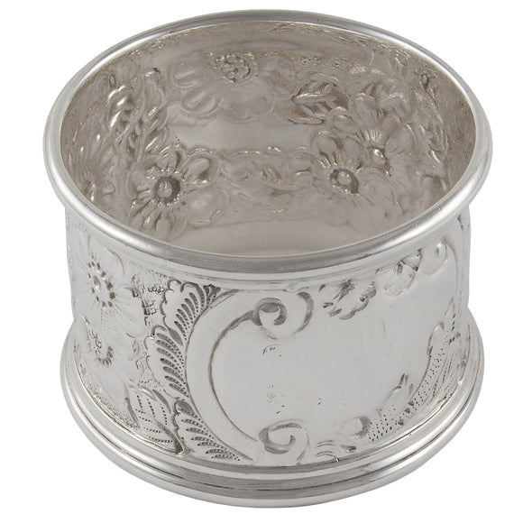 A Victorian, silver, embossed napkin ring