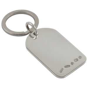 A modern, silver key fob with a blank tag with feature hallmarks.