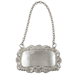 A mid-20th century, silver sherry decanter label.