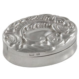 An Edwardian, silver, oval lidded box.