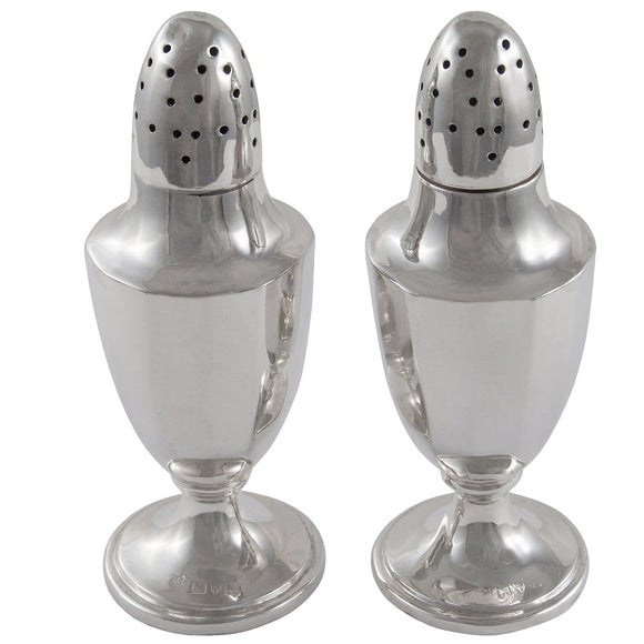 A pair of Edwardian, silver pepper pots