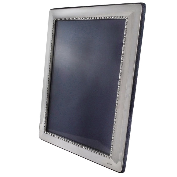 A modern, silver, rectangular photograph frame