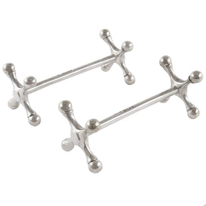 A pair of Edwardian, silver knife rests.