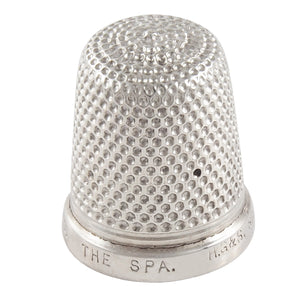 A mid-20th century, silver thimble
