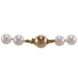 A modern, single row Akoya pearl necklace with a silver gilt snap