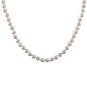 A modern, single row Akoya pearl necklace with a silver gilt snap