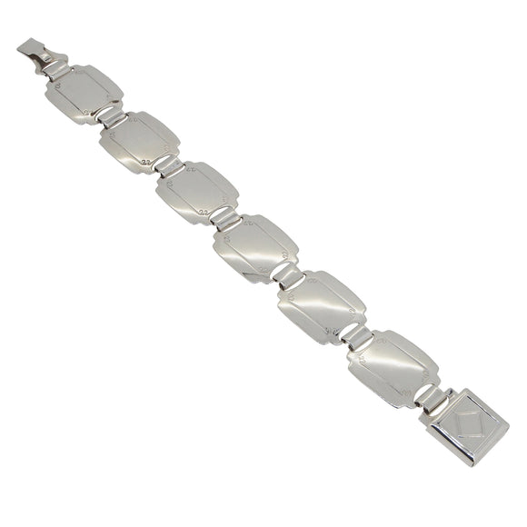 A silver, six panel bracelet