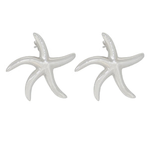 A pair of modern, silver, starfish earrings