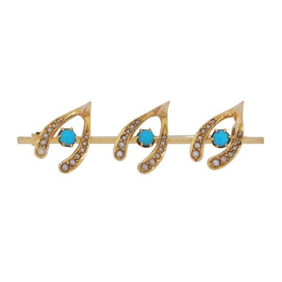 An Edwardian, yellow gold, turquoise & pearl set, three wishbone bar brooch