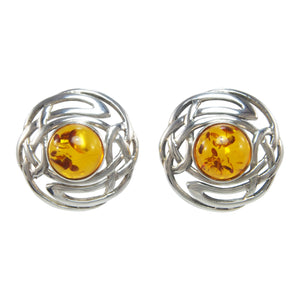 A pair of modern, silver, amber set, Celtic style earrings
