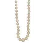 An early 20th century, single row of graduated Akoya cultured pearls on a 9ct yellow gold snap