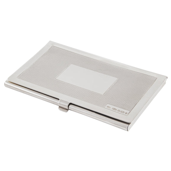 A modern, silver card case